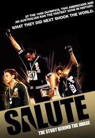 Gold medalist tommie smith (center) and bronze medalist john carlos (right) showing the raised fist on the podium after the 200 m race at the 1968 summer olympics; Salute Filmes No Google Play
