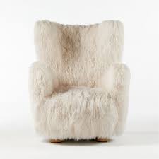 Consists of real mongolian sheepskin that is soft and beautiful. Bozzi Mongolian Sheepskin Chair Reviews Cb2