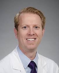 Guy E. Johnson M.D., Pharm.D.