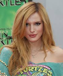 Bella thorne departed from her signature red locks for a new photoshoot, in which she rocked bright blonde hair and a versace swimsuit. 28 Bella Thorne Hairstyles Hair Cuts And Colors