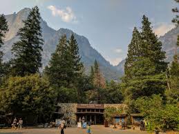 Yosemite national park entrance fee. Yosemite Valley Visitor Center In Foreground Where Unesco World Heritage Site Plaque Is Located With Lost Arrow Yosemite National Park National Parks Yosemite