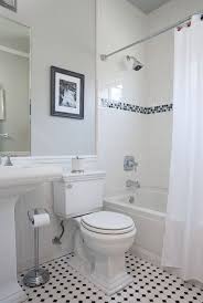 Black And White Mosaic Floor Tiles Bathrooms Awash In Black And White Tile White Bathroom Designs Bathroom Tile Designs Traditional Bathroom