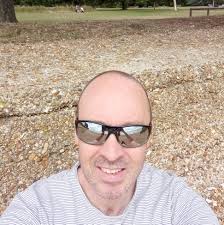 Watching football in cold autumn weather