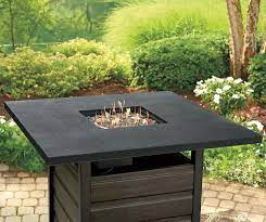 A fire pit cover will help protect the unit against fading and rusting, among other common effects of exposure to the elements. Wilson Fisher Bayshore High Bistro Fire Pit Table Big Lots Fire Pit Table Fire Pit Outdoor Settings