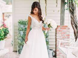 Match Your Hairstyle To Your Wedding Dress Neckline V Neck Wedding Dress Wedding Dress Necklines Wedding Dresses Romantic