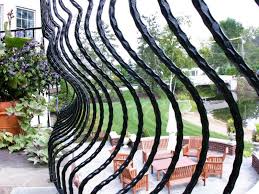 This document provides building photographs, and examples of defects found in inspecting indoor or outdoor stairs, railings wooden stair treads should be installed with the end grain curve down vs up: Curved Staircase Wrought Iron Belly Rail Great Lakes Metal Fabrication