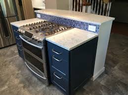 Shop modern & stylish kitchen furniture only at west elm®. White Cabinets With Dark Blue Island Cabinets Double Oven Range Transitional Kitchen Houston By Bay Area Kitchens Houzz