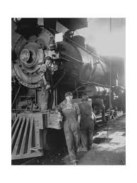 Women Rail Workers Standing At Work On Engine Of Train During Wwi At Great Northern Railway Photographic Print Art Com In 2020 Train Locomotive Old Trains