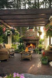 In tuscan style room, all side tables and back tables have many original items on them. 59 Beautiful Tuscan Patio Design For Elegant Homes Backyard Patio Designs Backyard Fireplace Backyard Pergola