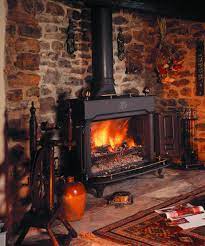 See more ideas about stove decor, wood stove, wood stove decor. With Flueless Wood Burning Stoves And Grey Stone Fireplace Surround Rustic Stone Fireplace Stone Fireplace Designs Fireplace Design
