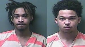 Two Michigan City men arrested for illegal possession of handguns