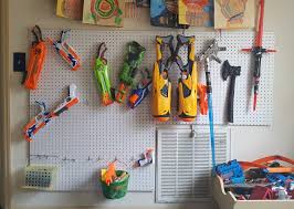 Then he designed and created this really great diy nerf gun storage wall. Diy Nerf Gun Pegboard Wall