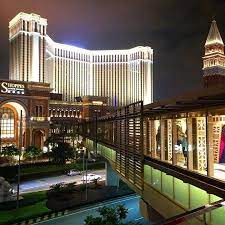 A View Of The Massive Venetian Hotel From A Footbridge That Connects It To Another Hotel Complex Sands Cotai Central Venetian Resort Hotel Cotai Strip Maca