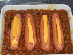 Bring to a boil and cook over medium heat until the chili has thickened slightly and the beef is fully cooked, about 20 minutes. Mom S Baked Hot Dogs With Beans