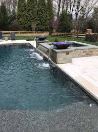 When you add pool water features to your pool, you'll get so much more out of it. Custom Pool With Fire Water Feature Reisterstown Md Inground Custom Pool Designer Builder
