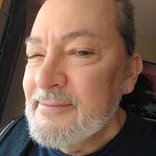 I will always picture Cousin Eddie standing by the pool in his white tank  top tucked into his speedo, while this song is playing.