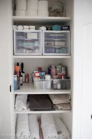 Kids Closet Organization With Dollar Store Bins So Much Better With Age Bathroom Linen Closet Bathroom Closet Organization Bathroom Closet