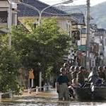Death toll nears Japan scrambles