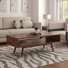 Add some clarity to your living room with the acrylic waterfall coffee table is the perfect addition to any home, bringing with it a clean, stylish feel that is sure to add some life to your living space. Bangor Solid Wood Coffee Table With Storage Natural Finish Decornation