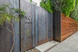 Improve the look of your lawn or garden by adding corten landscape edging and stakes. Corten Steel Gate In Venice Contemporary Garden Los Angeles By Pacific Garage Doors Gates Houzz Ie