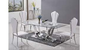 These polished modern dining tables provide plenty of space for eating but leave the room feeling airy and bright thanks to their transparency. Bridget Modern Glass Dining Table