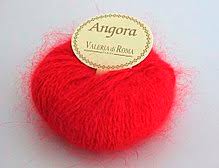 However, the famous angora goat breed from turkey has a woolen coat and no guard hair: Angora Wool Wikipedia