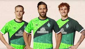 It has a dark gray base with black and white imagery from around bremen on its chest. Umbro Launch Werder Bremen 120th Anniversary Shirt Soccerbible