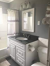 Black faucets with light wood vanity and black pulls. White Grey Bathroom Ideas Gray Bathroom Decor Gray Bathroom Accessories Gray And White Bathroom