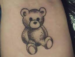 25 of the best gun tattoos 12 Small Teddy Bear Tattoo Ideas Petpress Teddy Bear Tattoos Bear Tattoo Designs Bear Tattoos