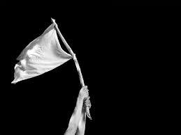 White flags have had different meanings throughout history and depending on the locale. White Flag Selfish Mother Blog