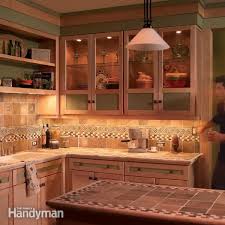 How To Install Under Cabinet Lighting In Your Kitchen Kitchen Under Cabinet Lighting Home Kitchens Installing Under Cabinet Lighting