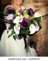 When planning a wedding, picking a unifying theme for the decor can be one of the. Colorful Wedding Bouquet Peacock Feathers Stock Photo Edit Now 212940757
