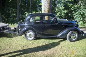 Sprinkled between pastures of grazing. Ford Eifel Sedan