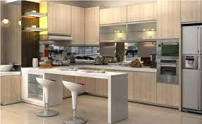 Kitchen set hijau pastel, menciptakan kesan ringan dan natural. Tips Design Kitchen Set Mewah Agar Selalu Bersih Dan Rapih