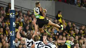 Richmond's shai bolton has taken one of the more memorable marks so far in season 2021, climbing over cats defender mark blicavs before slotting a first quarter goal. 1usqmtzyxu9tym