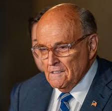 Giuliani settles with Georgia election workers over defamation payout