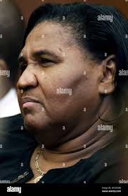 Louella Thomas, aunt of Quinton Tellis, 29, who is charged with burning  19-year-old Jessica Chambers, to death almost three years ago, sits in a  Batesville, Miss., courtroom, and listens as the prosecution