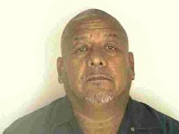 One Gang Member Still Wanted in Stabbing