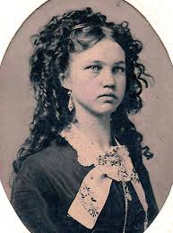 A photo of a young lady from 1870s.