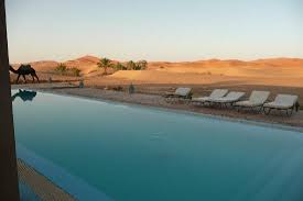 Our merzouga desert quad excursions are suitable for everyone even beginners , or professionals this is private desert trip to merzouga desert. Dream View Of The Pool At Sunset Picture Of Hotel Kanz Erremal Merzouga Tripadvisor