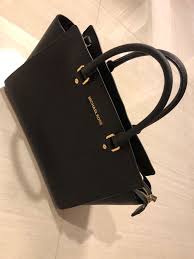 What kind of cloth do you use to clean michael kors bags? Classic Michael Kors Bag M Size Free Michael Kors Bag Cleaner Conditioner Women S Fashion Bags Wallets Cross Body Bags On Carousell