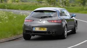 Image result for Rosso Alfa 2010 Brera