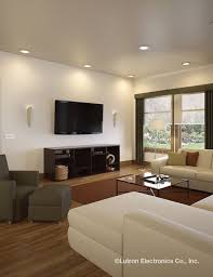Neutral Colors Simple Fabrics And Recessed Lighting In The Family Room Keep The Focus On Big Screen Family Room Living Room Without Fireplace Rooms Home Decor