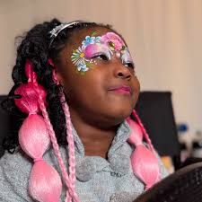 Sparklyy Face Painting added a...