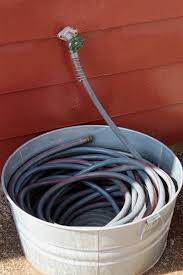 Pin By Rossion Sophie On Backyards On A Budget Diy Backyard Red Farmhouse Hose Holder