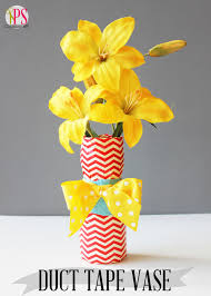 Always wanted to make duct tape flowers? Upcycled Plastic Container And Duct Tape Vase