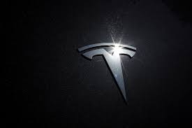 What do you see when you look at the tesla logo? Tesla Electrifies The Auto Industry S New Era