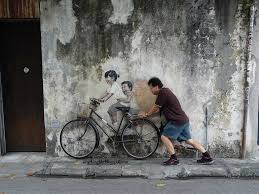 This was a common sight back in the old days whereby nyonya kuih sellers (most of them are indians) would be either cycling or walking around the town selling the local delicacies. Anythinglily Penang Attraction The Street Art Trail