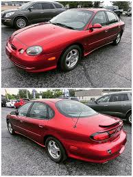 Image result for Toreador Red 1999 Town Car