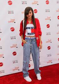 See more ideas about aaliyah style, aaliyah, aaliyah haughton. This Tommy Hilfiger Look In 2013 Brought To Mind Aaliyah S Style In 50 Reasons Zendaya Is Already A Style Icon In Our Eyes Popsugar Fashion Uk Photo 18